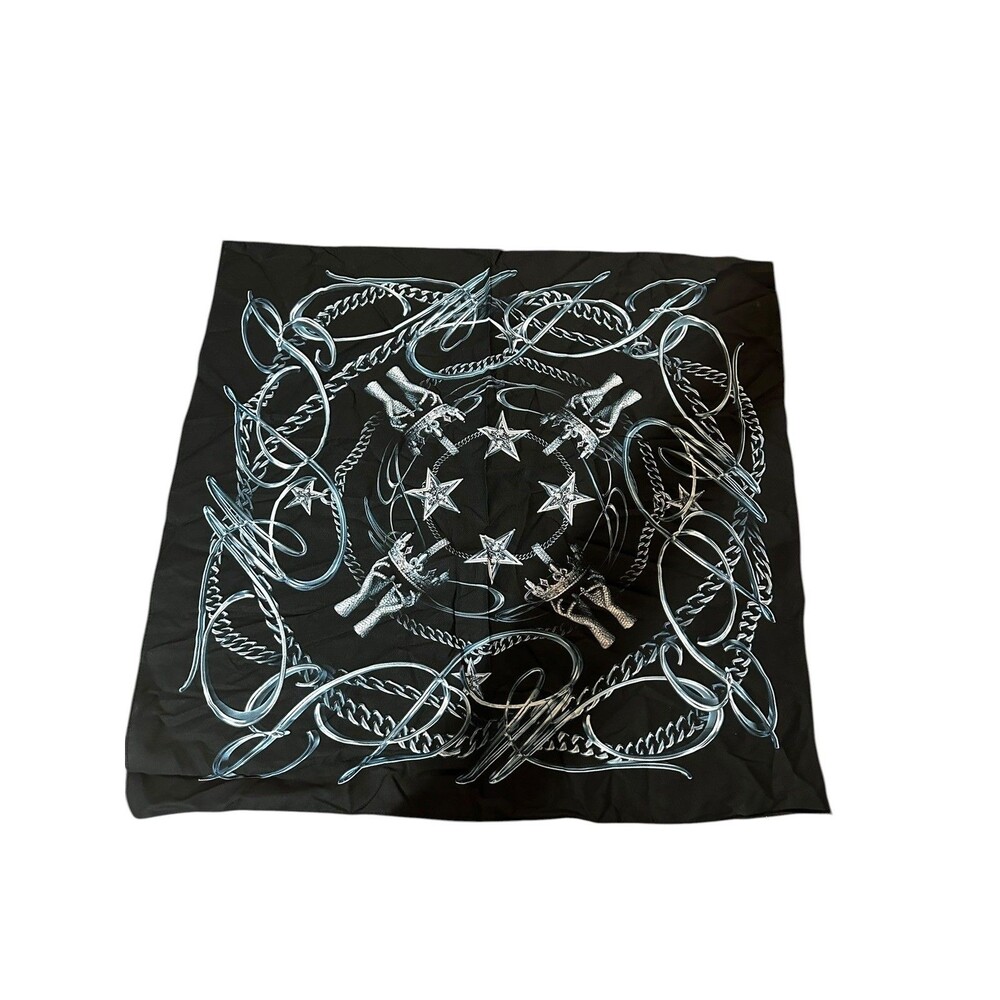 black scarf with a decorative chain and star pattern